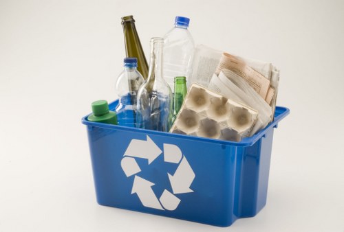 Rubbish removal team sorting recyclable materials in Richmond upon Thames