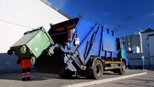 Rubbish removal team pricing clear waste from a Richmond upon Thames property