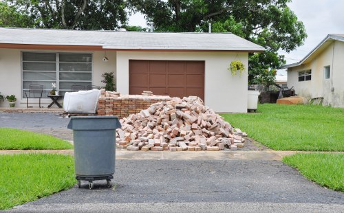 Professional builders waste removal service handling renovation debris in Richmond Upon Thames